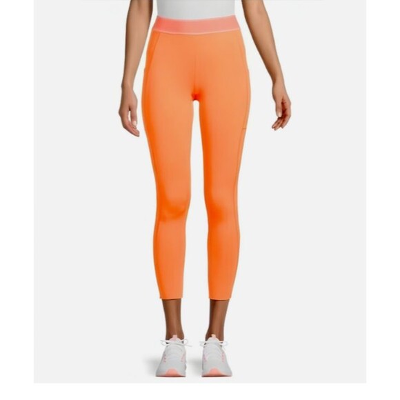 Free People/ FP Movement SMALL LEGGING WORKOUT GYM POCKET NEON ORANGE - Picture 1 of 12